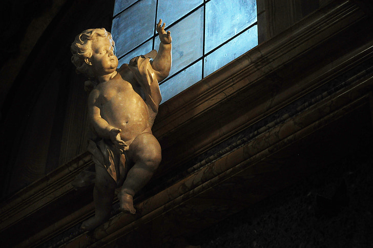 cherub angel near window