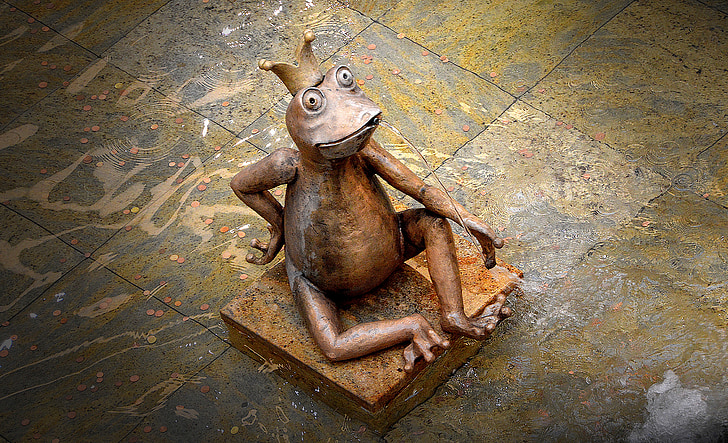 top view photography of brown frog ceramic figurine