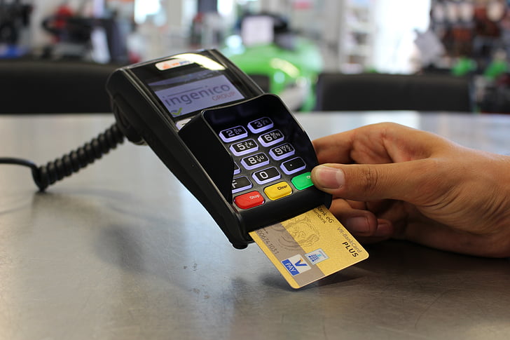Ingenico credit card terminal with VISA card