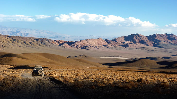 gray vehicle in desert