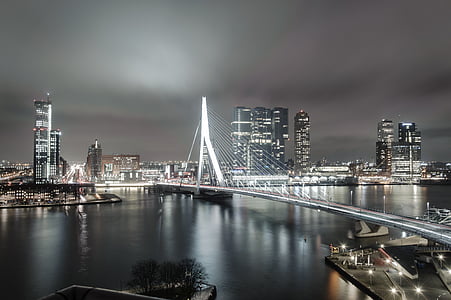 lighted concrete bridge at night
