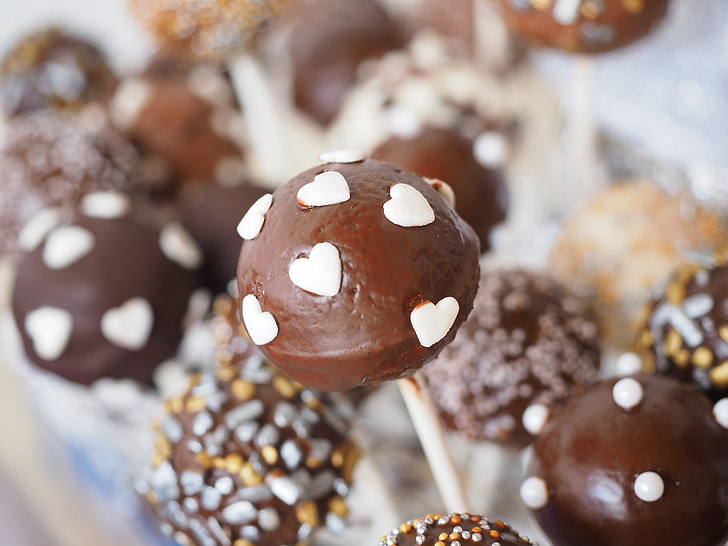 selective focus photo of chocolate cake pops