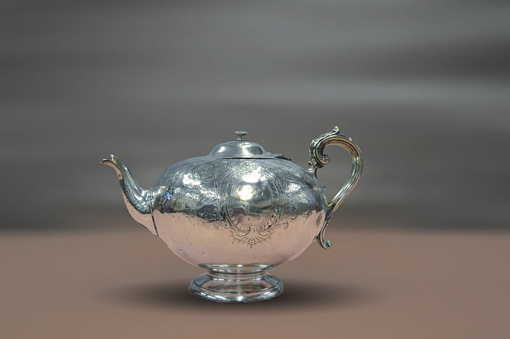 macro shot of stainless steel teapot