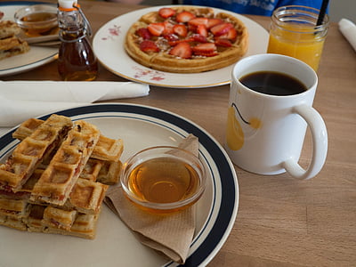 plate of waffles and cup of coffee