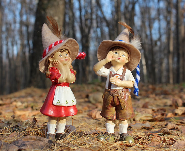 boy and girl ceramic figurines