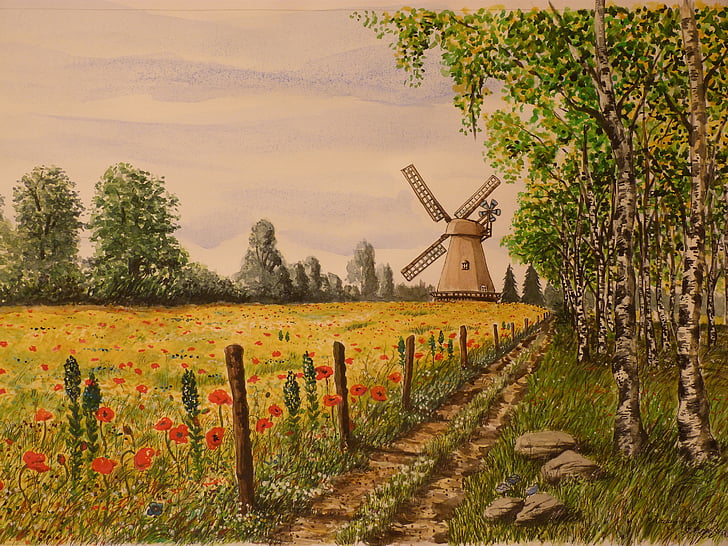 brown windmill and green leaf trees