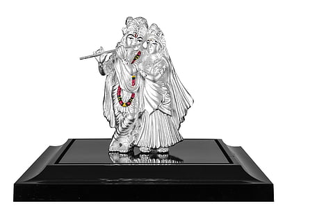 silver figure of man and woman table decors
