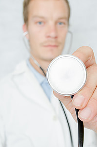 man holding stethoscope