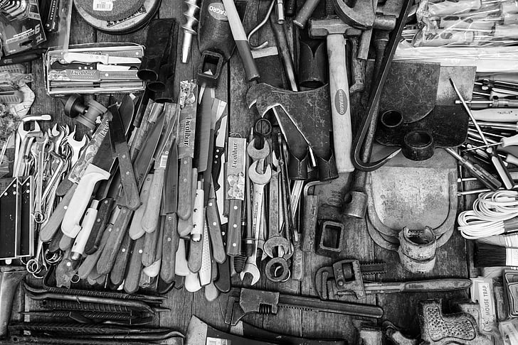 grayscale photo of assorted tools