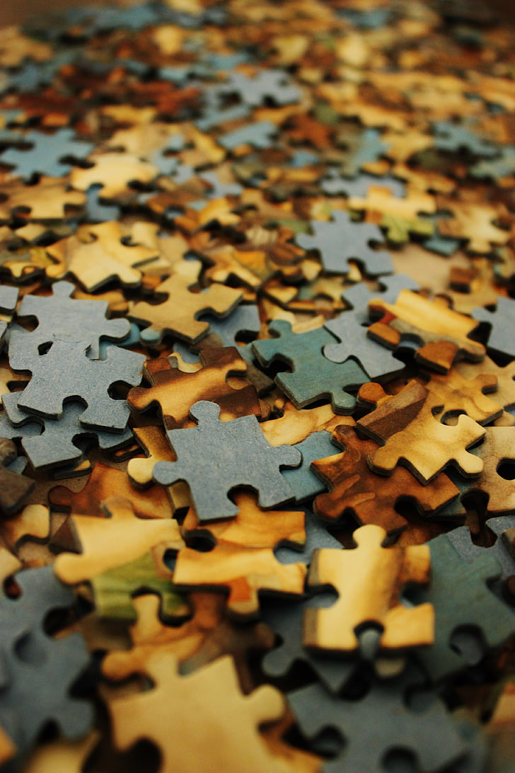 shallow focus photography of jigsaw puzzles