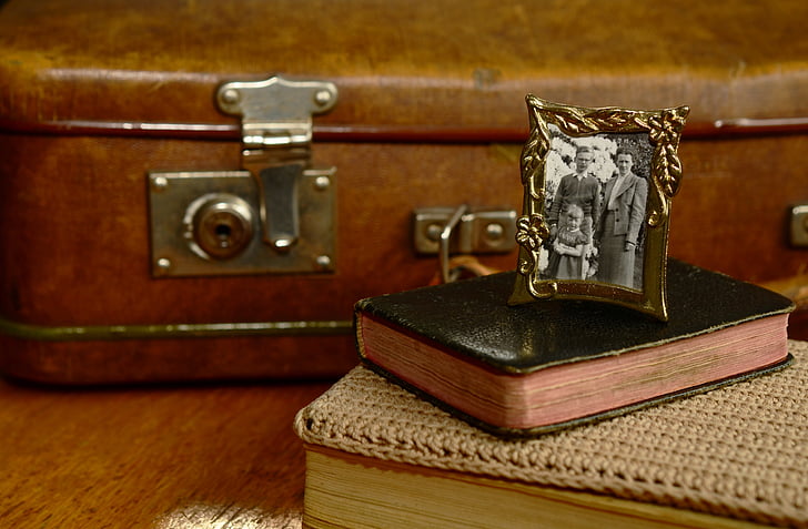 brass photo frame with book