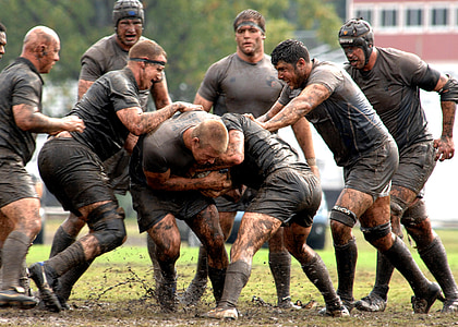 several man doing rugby training during daytime