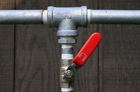 gray metal water valve on