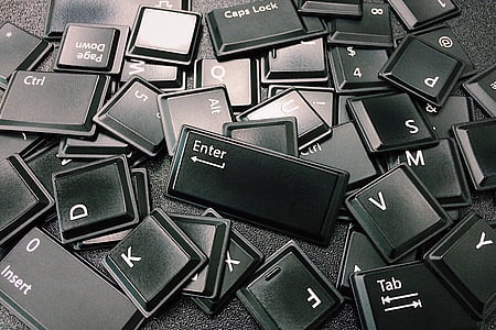 black computer keyboard keys on black surface