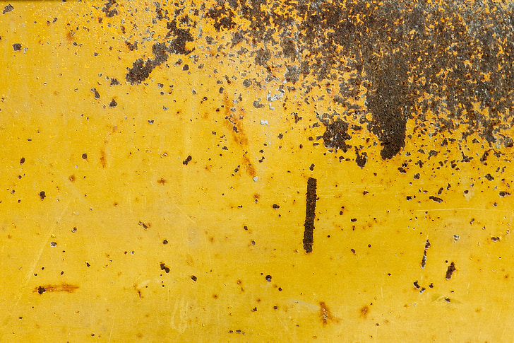 brown dirt in yellow surface