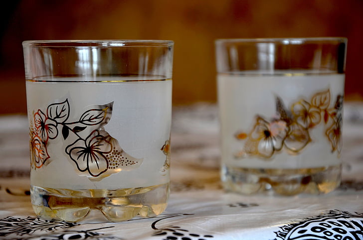 two white drinking glasses