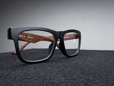 selective focus photography of black-framed wayfarer-style eyeglasses