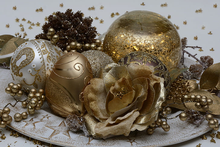 gold and silver decorative flowers and balls