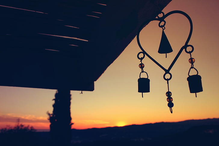 silhouette of wind chimes