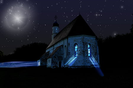 white and brown church during nighttime
