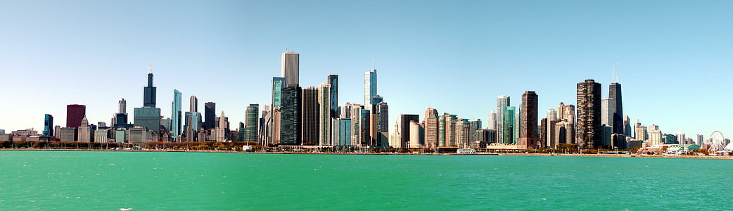 panoramic photography of buildings near body of water at daytime