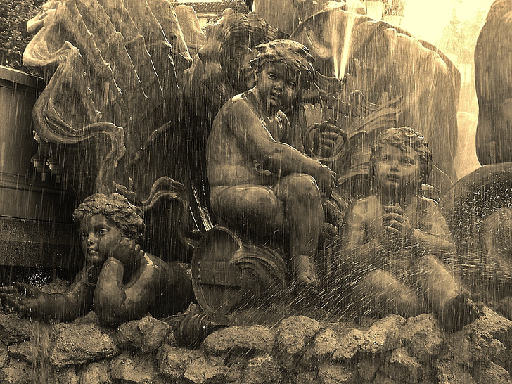 brown cherub statue fountain