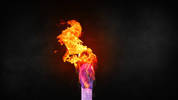 flaming stick with black background