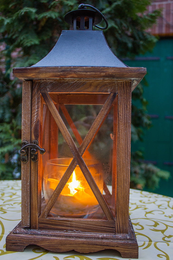 brown wooden candle lantern