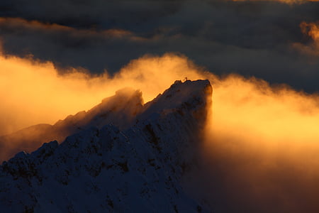 snow mountain covered with clouds