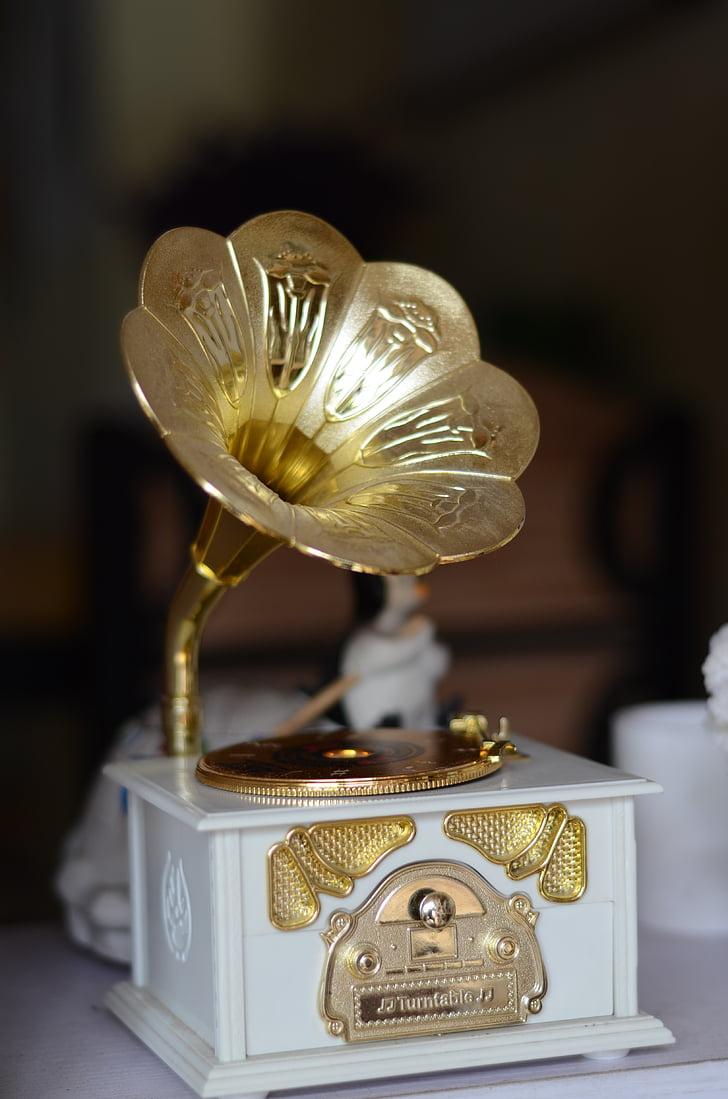 Royalty-Free photo: Brass-colored and white gramophone | PickPik