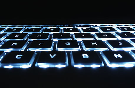 photography of computer keyboard keys with lights