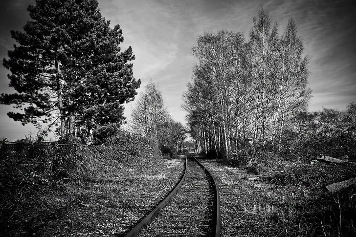 train rail grayscale photography