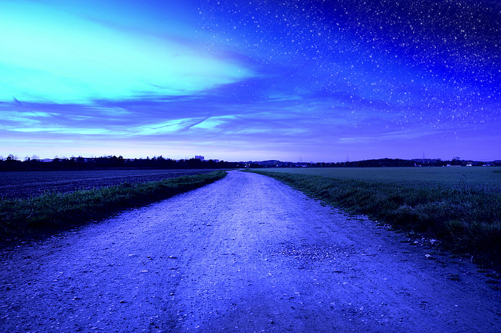 wide road under blue sky