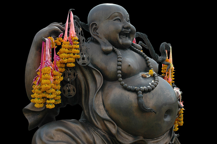 Royalty-Free photo: Laughing Buddha figurine | PickPik