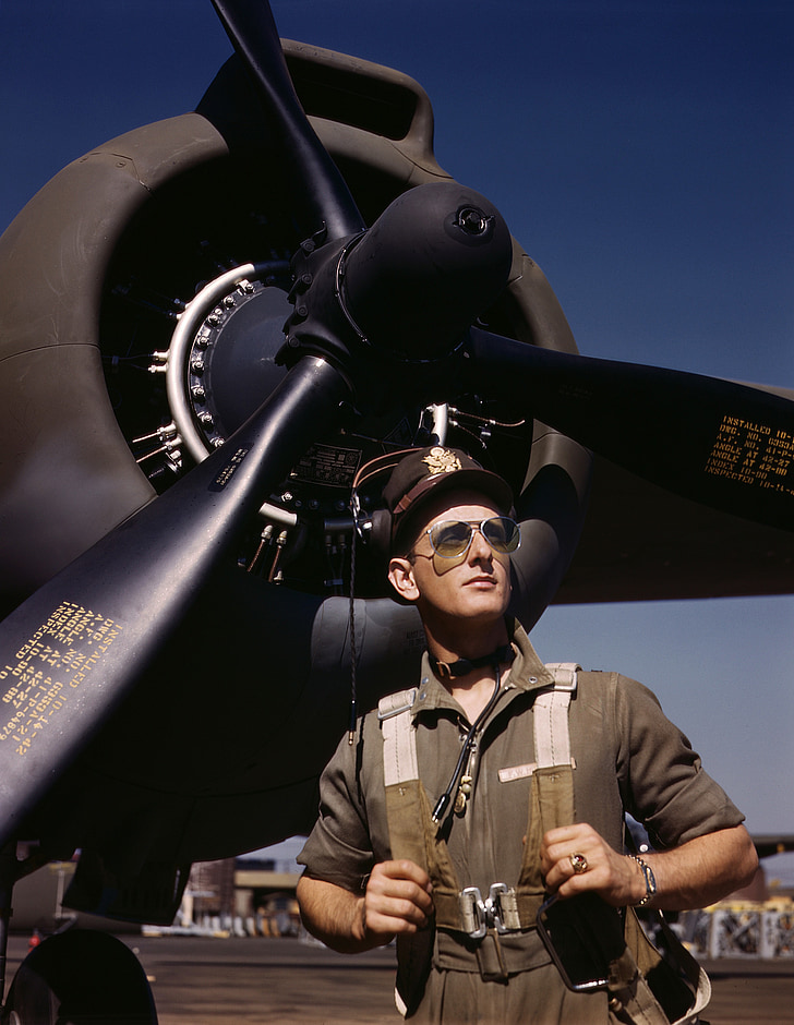 man standing in front of the airplane
