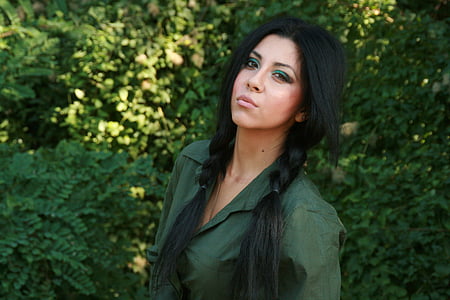 woman wearing green collared top