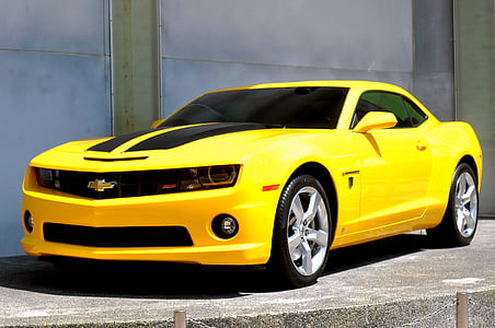 yellow Chevrolet sports car
