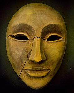 beige face mask figurine
