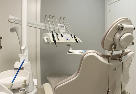 empty white dentist clinic chair
