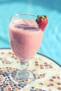 glass with strawberry shake
