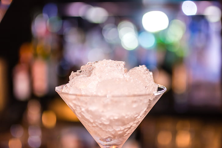 closeup photography of ice in martini glass