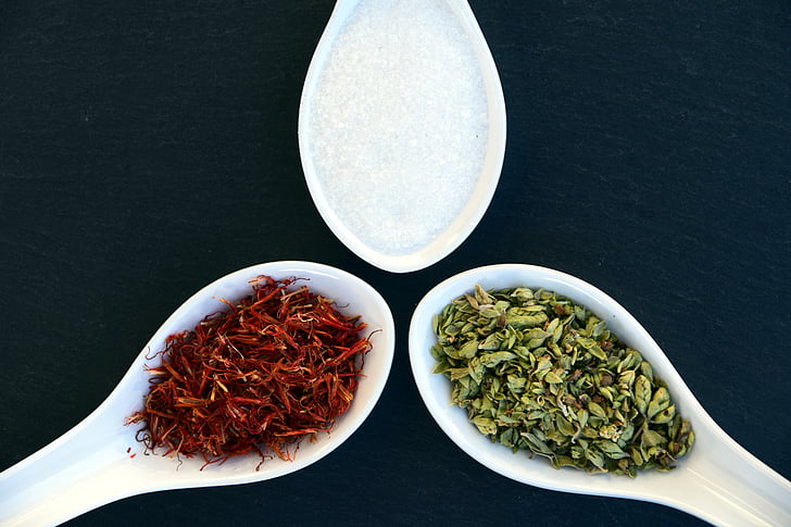 three spoons of variety of spices