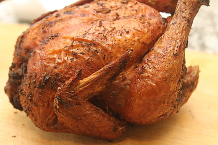 roasted chicken on chopping board