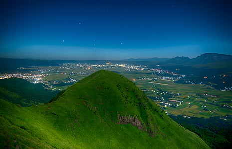 green mountain at nighttime illustration