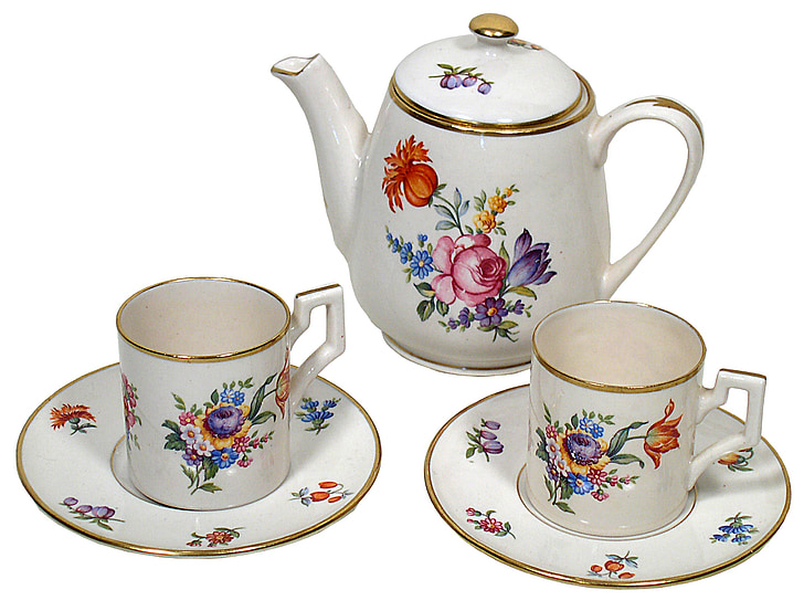 white-pink-and-blue floral ceramic teapot, teacups, and saucers