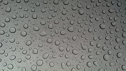 water drop on gray surface