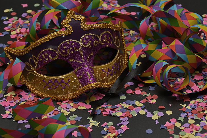 purple and yellow masquerade mask