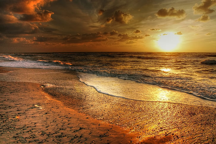 photo of beach sunset at sunset