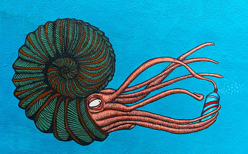 green and brown squid with shell painting