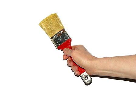 person holding red paintbrush